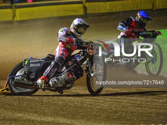 
Dan Bewley (White) outside Craig Cook (Blue) during the SGB Premiership Grand Final 2nd leg between Peterborough and Belle Vue Aces at East...