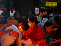 Nepalese Hindu devotees offer oil lamps on the tenth day of Dashain Festival  at Baramahini Temple in Bhaktapur, Nepal, October15, 2021. The...