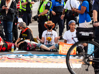 Native American climate activists and allies are arrested at the US Capitol during a youth-led civil disobedience action against the continu...