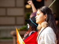 Native American climate activists and allies march to the US Capitol during a youth-led protest against the continued use of fossil fuels, o...