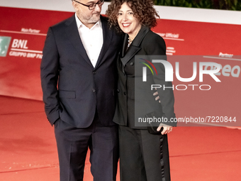 Director Giuseppe Bonito and a guest attend the red carpet of the movie 