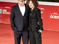 Director Giuseppe Bonito and a guest attend the red carpet of the movie 