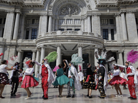 Dancers from Tlaxcala and Puebla, perform the Dance of the Huehues in the esplanade of the Palace of Fine Arts in Mexico City, on the occasi...