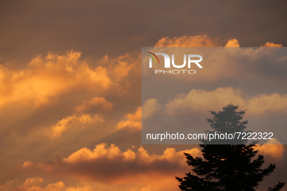 Sunset clouds are seen in Stuttgart, Germany on October 9, 2021 