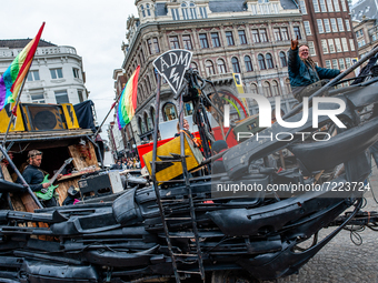 A truck with the shape of a pirate ship is arriving to the Dam Square before the ADEV parade started in Amsterdam. Every year, the ADEV demo...