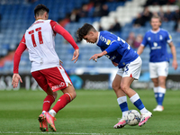 Oldham Athletic's Benny Couto tussles with Elliot Osborne of Stevenage Football Club during the Sky Bet League 2 match between Oldham Athlet...