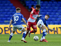 Oldham Athletic's Jamie Bowden tussles with Bruno Andrade of Stevenage Football Club during the Sky Bet League 2 match between Oldham Athlet...