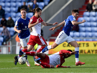 Oldham Athletic's Jamie Bowden tussles with Terence Vancooten of Stevenage Football Club during the Sky Bet League 2 match between Oldham At...
