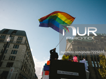 about 4000 people gather for Christopher street day gay pride parade in Duesseldorf, Germany on Oct 16, 2021 (