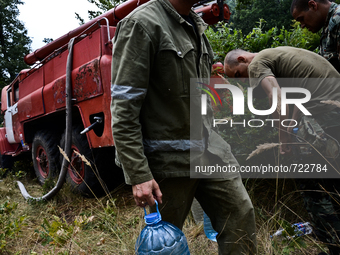 Bulgarian military bring water to the area of the fire near a village of Valcha polyana, Elhovo, Bulgaria on August 07, 2015 (