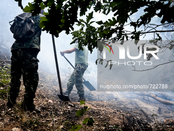 Bulgarian military spray water on forest burned area at  Valcha polyana, Elhovo, Bulgaria on August 07, 2015 (