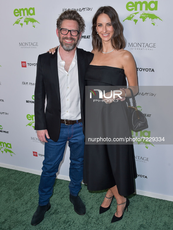 Director K. Asher Levin and wife/stylist Molly Levin arrive at the Environmental Media Association (EMA) Awards Gala 2021 held at GEARBOX LA...