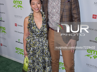 Linda Phan and husband/television personality Drew Scott arrive at the Environmental Media Association (EMA) Awards Gala 2021 held at GEARBO...