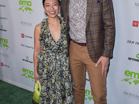 Linda Phan and husband/television personality Drew Scott arrive at the Environmental Media Association (EMA) Awards Gala 2021 held at GEARBO...
