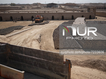 A view of a brick factory that a group of Afghan refugees work there, in the Borkhar area in the west of the city of Isfahan 439Km (273 Mile...