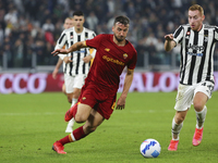 Bryan Cristante of AS Roma and Dejan Kulusevski of Juventus FC during the match between Juventus FC and AS Roma on October 17, 2021 at Allia...