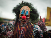 A men wears a clown costume during the fourth day of the SOFA (Salon del Ocio y la Fantasia) 2021, a fair aimed to the geek audience in Colo...