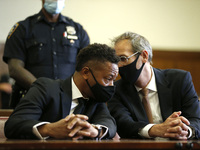 Actor Cuba Gooding Jr. and his attorney Mark Heller listen to court proceedings as he is accused of sex crimes in Lower Manhattan on October...