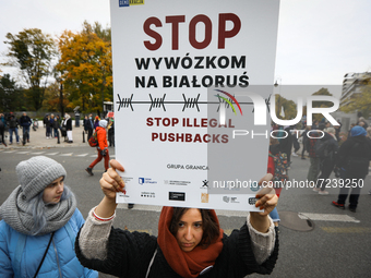 Over a thousand people gather in the center of Warsaw, Poland on 17 October, 2021 to demand an end to illegal push-backs at the border with...