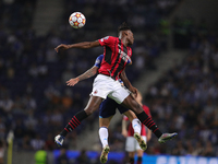 Rafael Leao forward of AC Milan (R) vies with Porto’s Brazilian midfielder Otavio (L) in action during the UEFA Champions League Group stage...