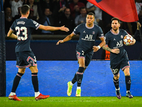 Lionel (Leo) MESSI of PSG celebrate his goal with Kylian MBAPPE of PSG and Julian DRAXLER of PSG during the UEFA Champions League, Group A f...
