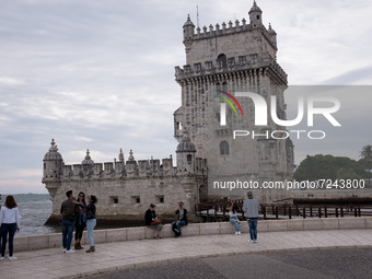 Tourists visit the Torre de Belem (Belem Tower) in Lisbon, Portugal on October 19, 2021. (