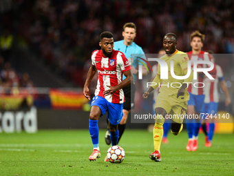 Thomas Lemar and Naby Keita during UEFA Champions League match between Atletico de Madrid and Liverpool FC at Wanda Metropolitano on October...