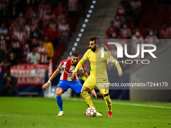 Mohamed Salah and Yannick Carrasco during UEFA Champions League match between Atletico de Madrid and Liverpool FC at Wanda Metropolitano on...