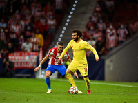 Mohamed Salah and Yannick Carrasco during UEFA Champions League match between Atletico de Madrid and Liverpool FC at Wanda Metropolitano on...
