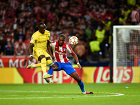 Naby Keita and Geoffrey Kondogbia during UEFA Champions League match between Atletico de Madrid and Liverpool FC at Wanda Metropolitano on O...