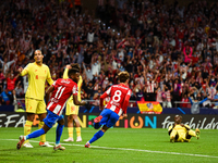 Antoine Griezmann celebrates a goal during UEFA Champions League match between Atletico de Madrid and Liverpool FC at Wanda Metropolitano on...