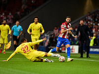 Yannick Carrasco and Joel Matip during UEFA Champions League match between Atletico de Madrid and Liverpool FC at Wanda Metropolitano on Oct...