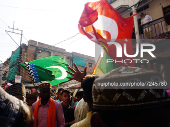 Indian Muslims seen during the procession of 'Eid-e-Milad-un-Nabi' on the occasion of birth anniversary of Prophet Muhammed, on October 19,...