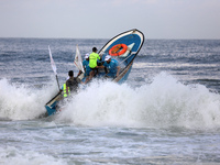  Palestinians attend the first water sports championship organised by the Palestinian Federation of Sailing and Rowing, on October 20, 2021,...