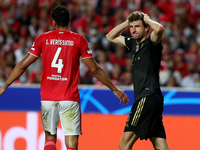 Thomas Muller of Bayern Muenchen (R ) reacts during the UEFA Champions League group E football match between SL Benfica and FC Bayern Muench...