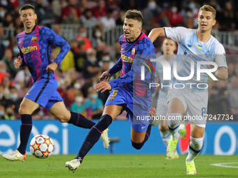 Vladyslav Supriaha and Gerard Pique during the match between FC Barcelona and Dinamo Kiev, corresponding to the week 3 of the group stage of...