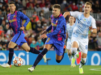 Vladyslav Supriaha and Gerard Pique during the match between FC Barcelona and Dinamo Kiev, corresponding to the week 3 of the group stage of...