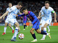 Serhiy Sydorchuk, Tomasz Kedziora and Philippe Coutinho during the match between FC Barcelona and Dinamo Kiev, corresponding to the week 3 o...