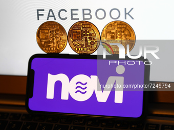 Novi logo displayed on a phone screen, representation of cryptocurrencies and Facebook company logo displayed on a laptop screen are seen in...
