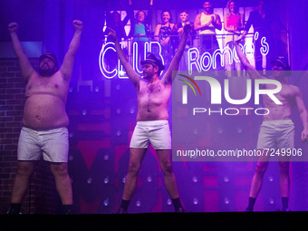 Cast members dance during a performance of the musical 'Full Monty' at the Teatro Rialto on October 21, 2021, in Madrid, Spain. This adaptat...