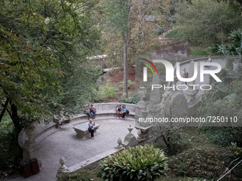 Tourists visit Quinta da Regaleira gardens and palace in Sintra, Portugal on October 21, 2021. (