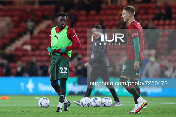 Barnsley's Clarke Oduor and Cauley Woodrow warm up  during the Sky Bet Championship match between Middlesbrough and Barnsley at the Riversid...