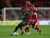 Middlesbrough's Lee Peltier in action with Barnsley's Clarke Oduor  during the Sky Bet Championship match between Middlesbrough and Barnsley...