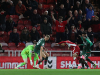  Middlesbrough's Duncan Watmore goes down after a challenge from Barnsley's Claudio Gomes during the Sky Bet Championship match between Midd...
