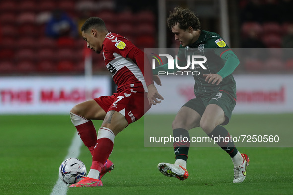 Middlesbrough's Marcus Tavernier in action with Barnsley's Callum Styles during the Sky Bet Championship match between Middlesbrough and Bar...