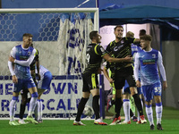 Scunthorpe United's Ryan Loft sends Paul Farman the wrong way but misses from the penalty spotduring the Sky Bet League 2 match between Barr...