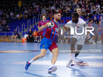 Blaz Janc of FC Barcelona in action during the EHF Champions League match between FC Barcelona and PSG Handball at Palau Blaugrana in Barcel...
