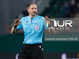 Referee Harald Lechner gestures during the UEFA Europa League Group E football match between FC Lokomotiv Moscow and Galatasaray SK on Octob...