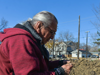 Elder Fernie Marty from the Papaschase First Nation, monitors excavations on the grounds of the former Charles Camsell Hospital, in Edmonton...