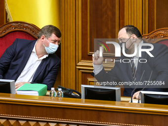 Speaker of Verkhovna Rada Ruslan Stefanchuk (R) talks to First Deputy Chairperson of the Verkhovna Rada Oleksandr Korniyenko (L) during the...